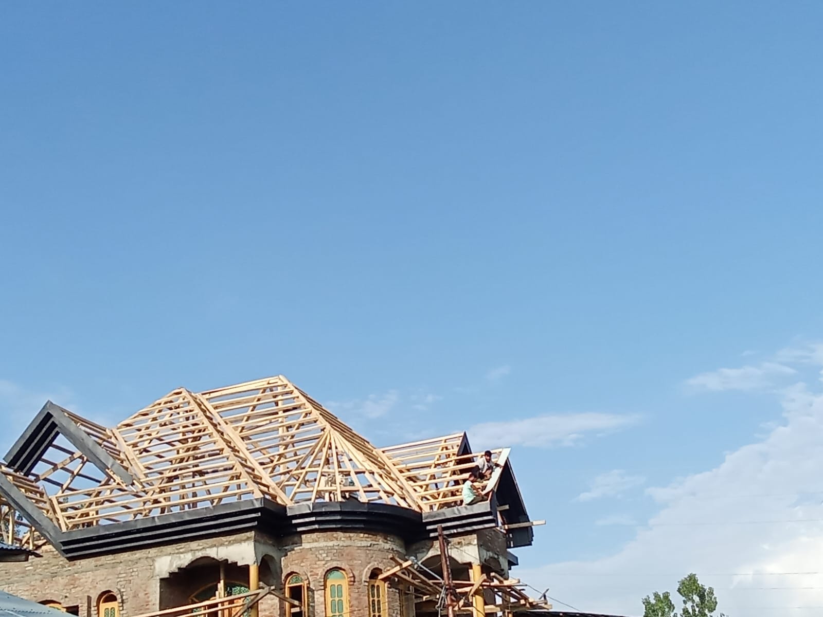 Client roofing project with timber roof detailing